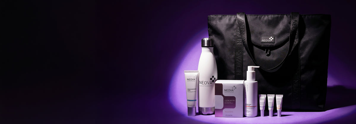 NEOVA - Week of Treats - A collection of white and silver skincare and travel items from the brand NEOVA, including a water bottle, shampoo with a pump top, and a box of exfoliating pads, displayed next to a black tote bag on a purple-lit dark background.