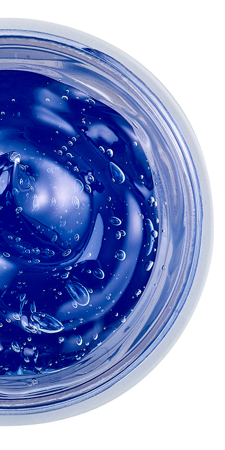 NEOVA - Copper Peptide Complex - Close-up of a blue copper gel mask in a container with air bubbles on a white background