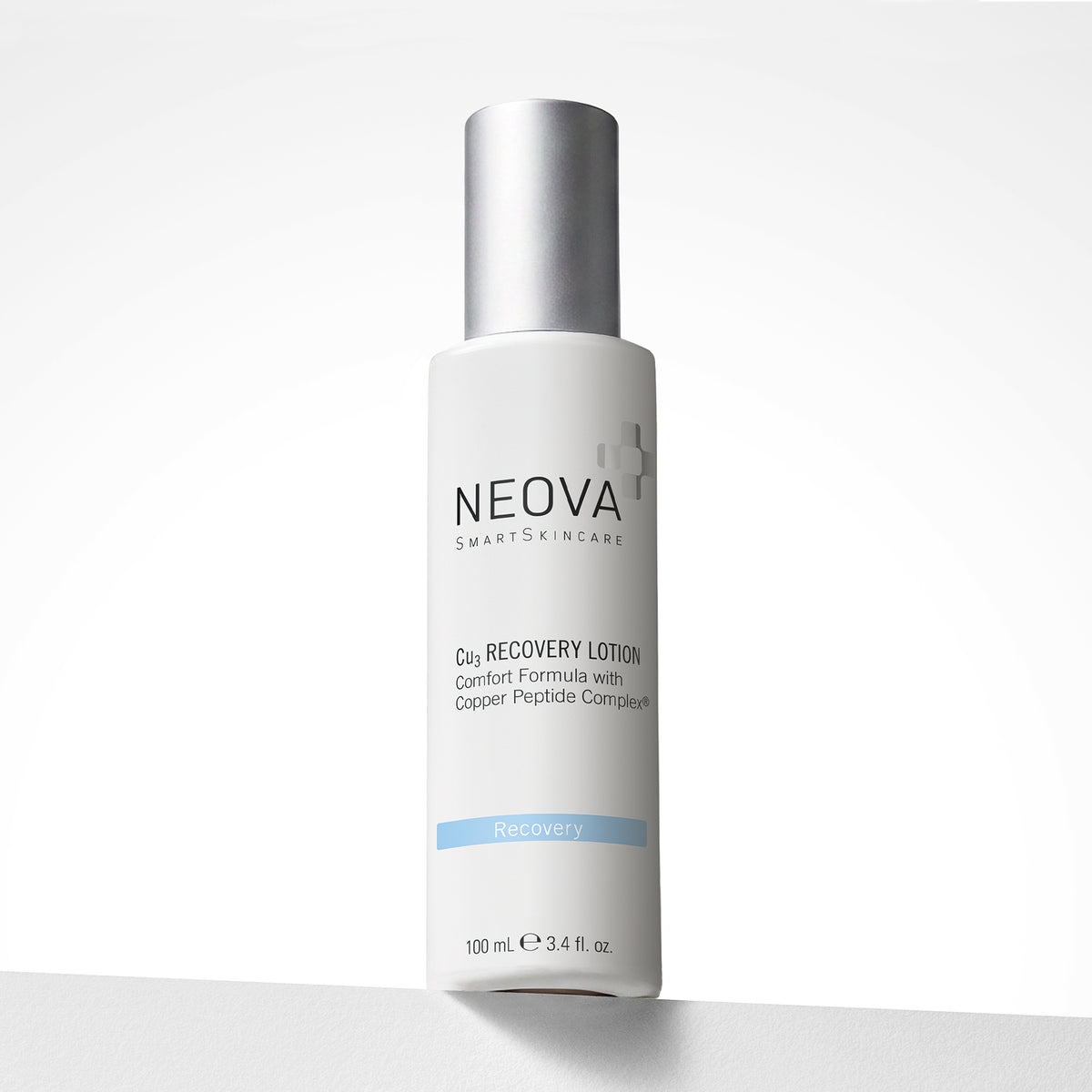 NEOVA Cu3 Recovery Lotion in a white glass bottle. The label describes it as a "Comfort formula with Copper Peptide Complex®" and categorizes it under a light blue "Recovery" banner. The bottle features a brushed silver cap and contains 3.4 fl. oz. (100 ml) of product. It is shown standing on a white surface against a clean, bright minimalist background.