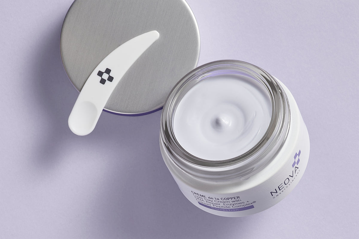NEOVA DNA CoFactor Science Image - Image of Creme de la Copper highlighting DNA repair enzymes and copper peptide complex technology through targeted moisturizers.