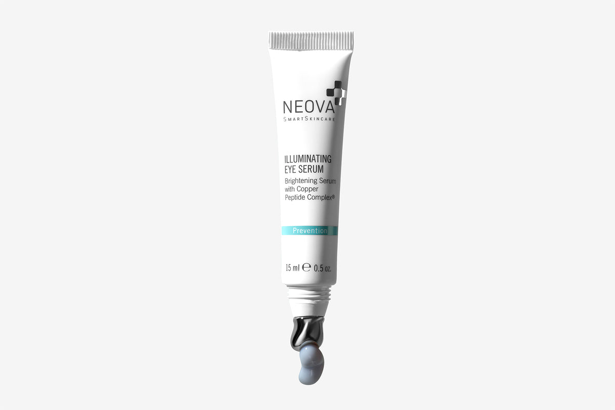 NEOVA DNA CoFactor Science Image - Image of an Illuminating Eye Serum tube with a cooling metal applicator and a drop of product, representing DNA repair and copper peptide complex technology through targeted, clinical treatment.