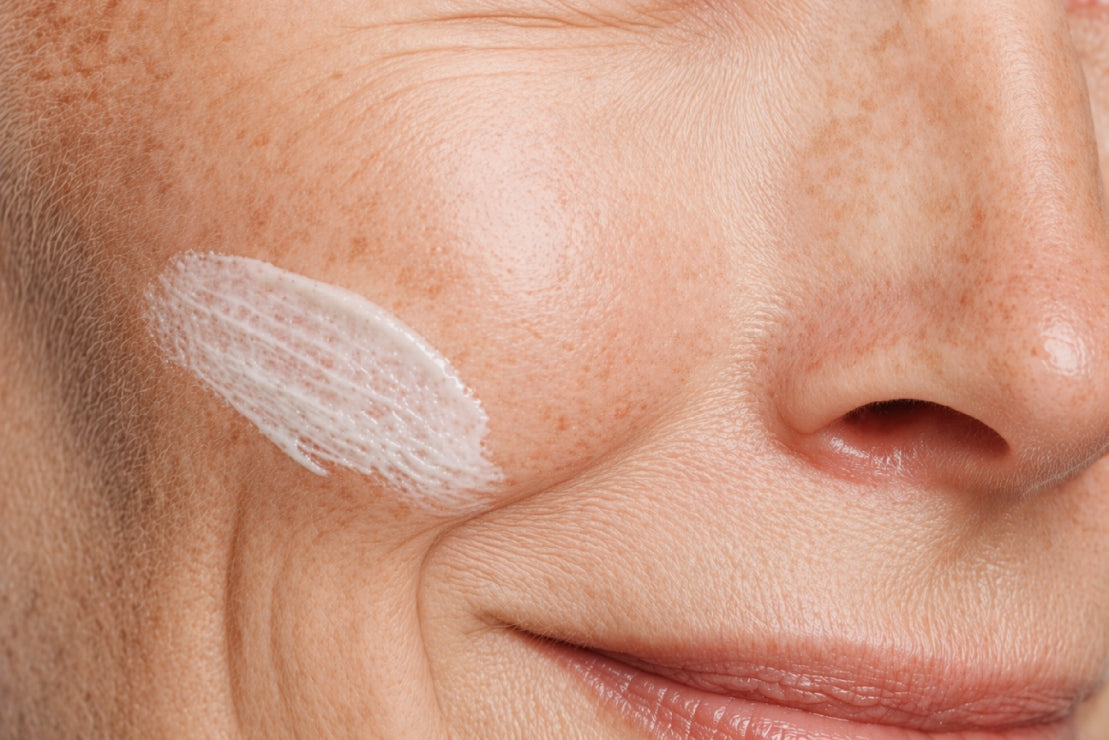 NEOVA DNA Total Repair – application: Close-up of cheek showing reparative treatment being applied to support DNA repair, improve skin resilience, and reduce visible signs of photodamage.