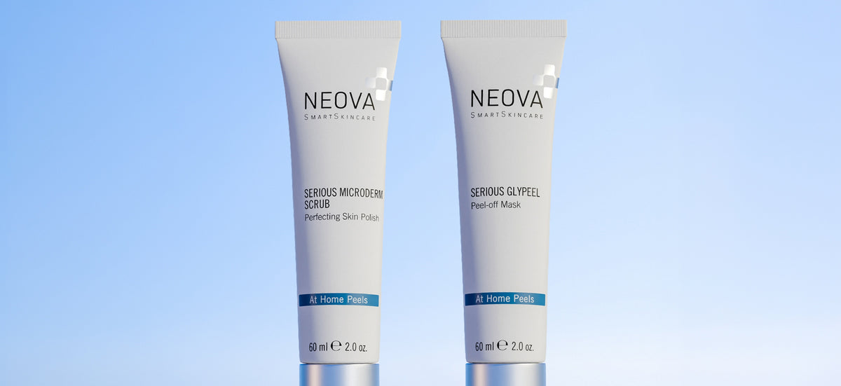 NEOVA - At Home Peels - Two white skincare tubes from NEOVA SmartSkincare standing upright against a light blue gradient background. The left tube is labeled 'SERIOUS MICRODERM SCRUB' and the right tube is labeled 'SERIOUS GLYPEEL Peel-off Mask'.