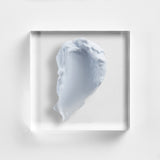 A medium-weight white cream swatch of Neova Night Therapy showing its smooth, nourishing consistency for intensive nighttime skin rejuvenation.