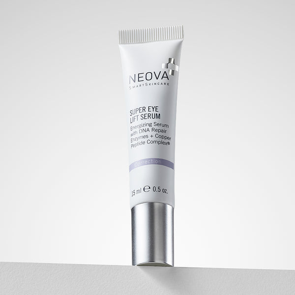 NEOVA Super Eye Lift Serum in a small, white cylindrical tube. The label describes it as an "Energizing Serum with DNA Repair Enzymes + Copper Peptide Complex®" and categorizes it under a light purple "Correction" banner. The tube features a brushed silver cap and contains 0.5 fl. oz. (15 ml). It is shown standing on a white surface against a clean, bright minimalist background.